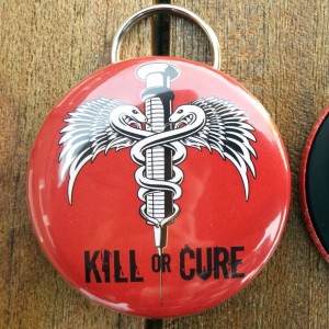 Kill or cure bottle opener keyring red